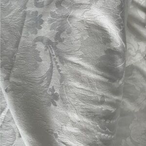 White silk fabric with Elegant Textural Design